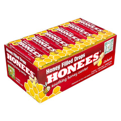 HONEES Honey Filled Drops bottle close-up demonstrates natural honey soothing throat discomfort.