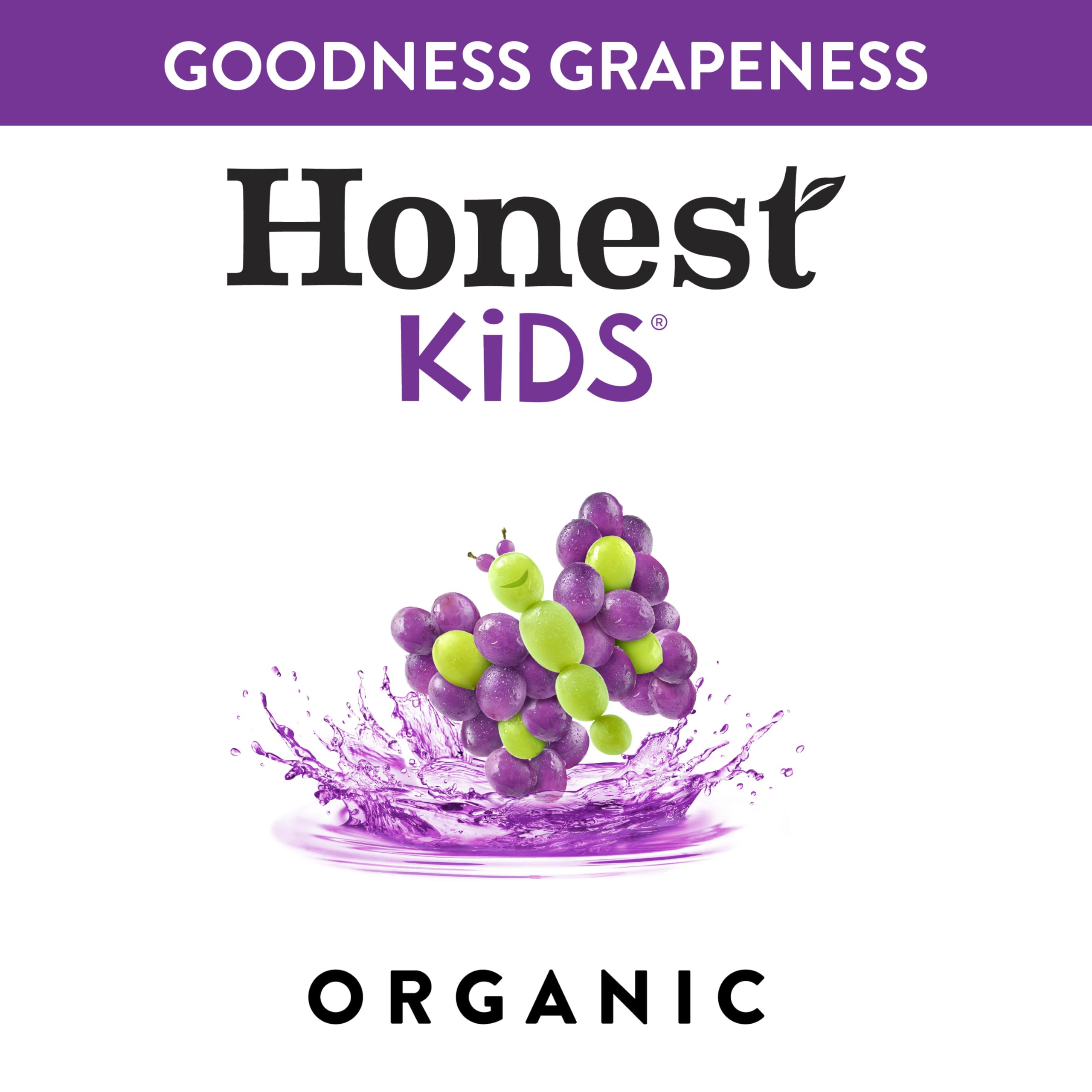 Honest Kids Goodness Grapeness kid smiles while enjoying this tasty juice