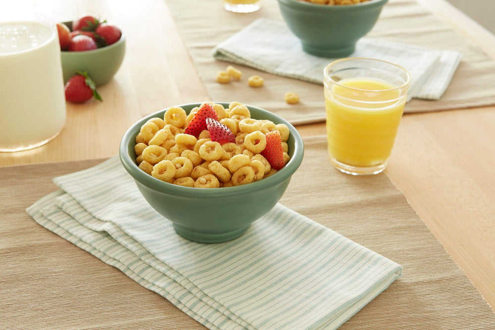 Honey Ohs! cereal corn-oats-rice blend shown in bowl delivers satisfying crunch