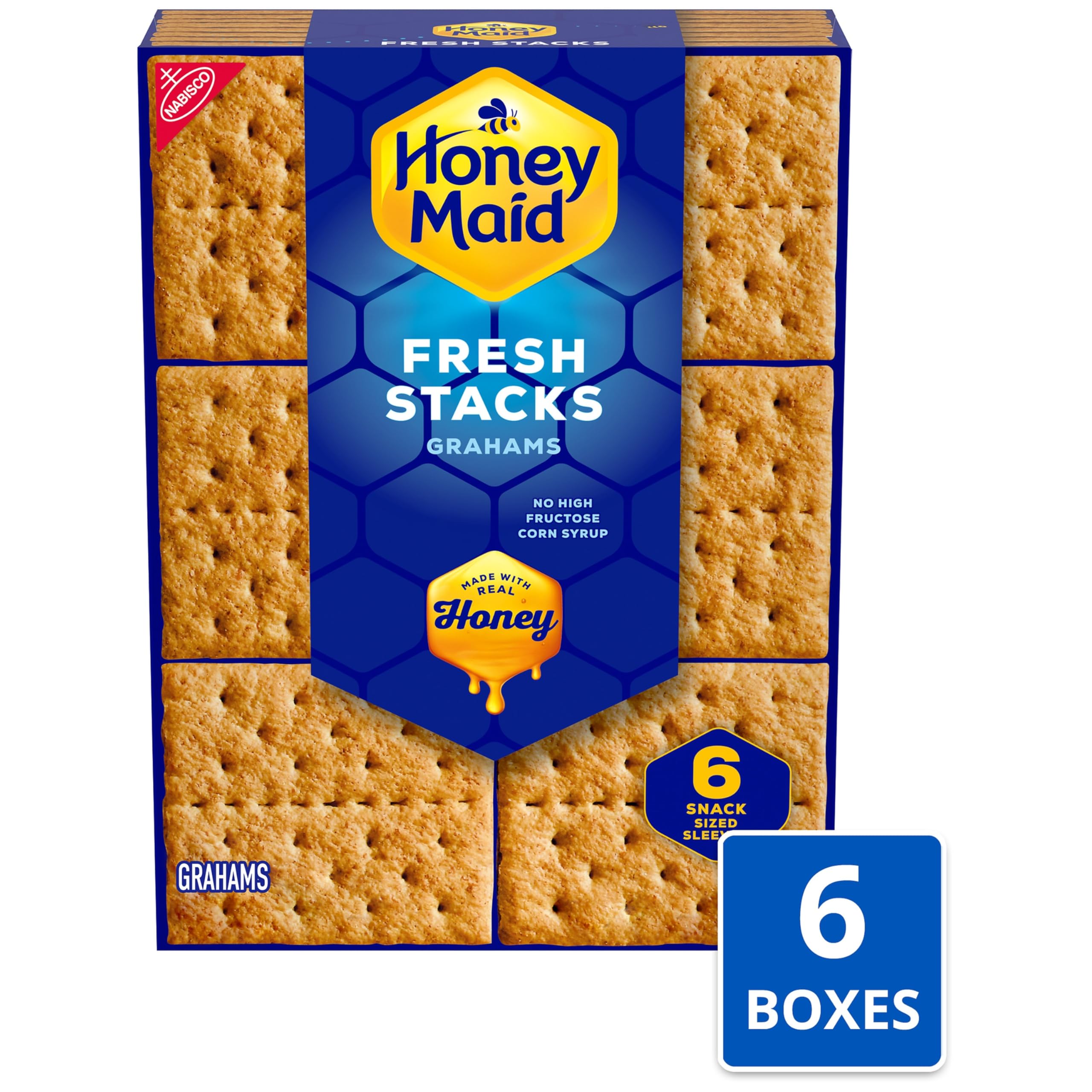 Honey Maid graham crackers with marshmallows and chocolate, ideal for s'mores at home.