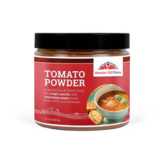 Hoosier Hill Farm Tomato Powder jar closeup shows vibrant color for savory sauces.