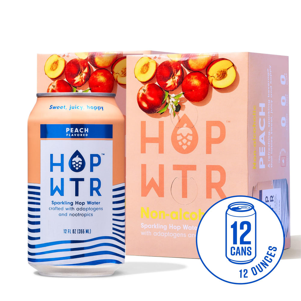 Glass poured with HOP WTR Peach, crisp peach aroma and bold hop notes.