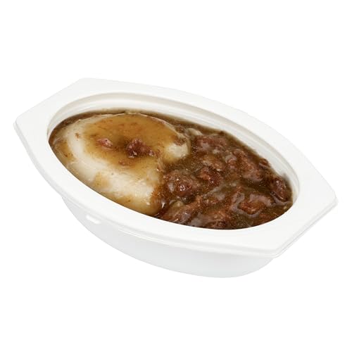 Creamy mashed potatoes with Hormel Compleats tender beef close-up.