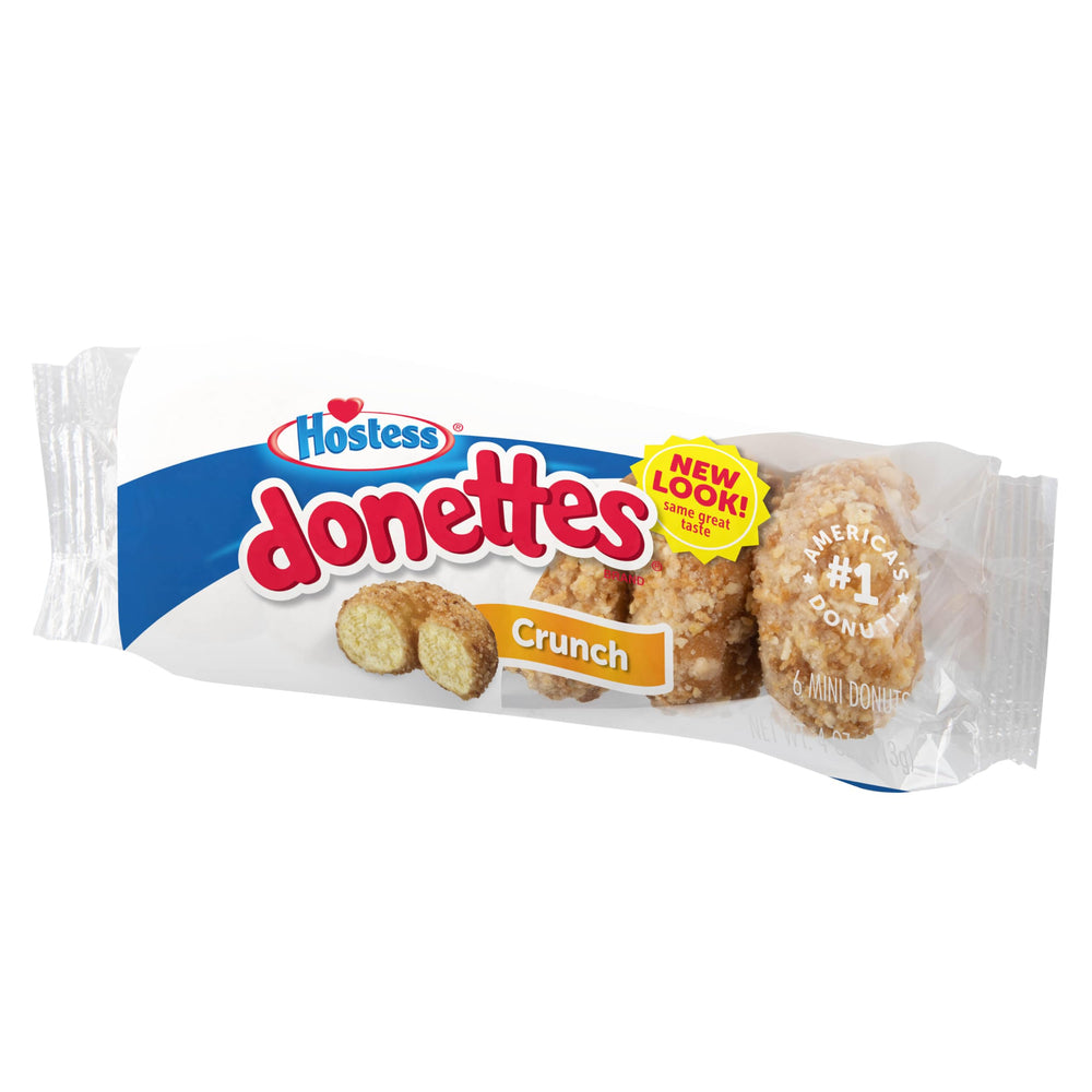 Opened packaging reveals individual servings for on-the-go snacking with Hostess Crunch Donettes.