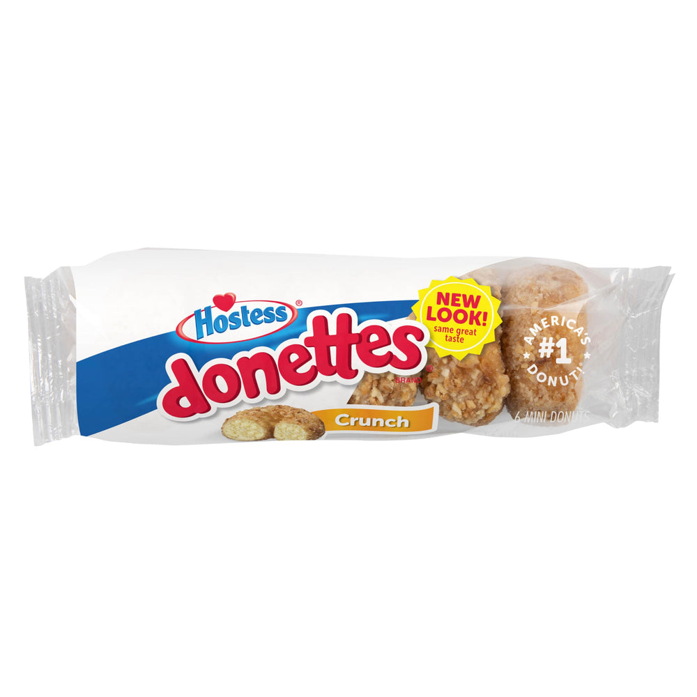 Hostess Crunch Donettes beside orange juice illustrate a grab-and-go morning ritual.