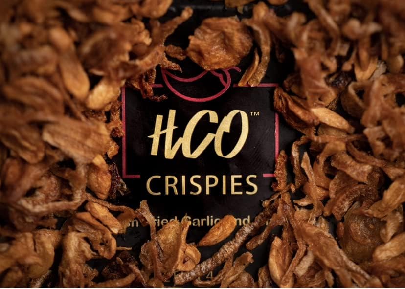 Hot Crispy Oil Crispies topping a fresh salad for texture and aroma.