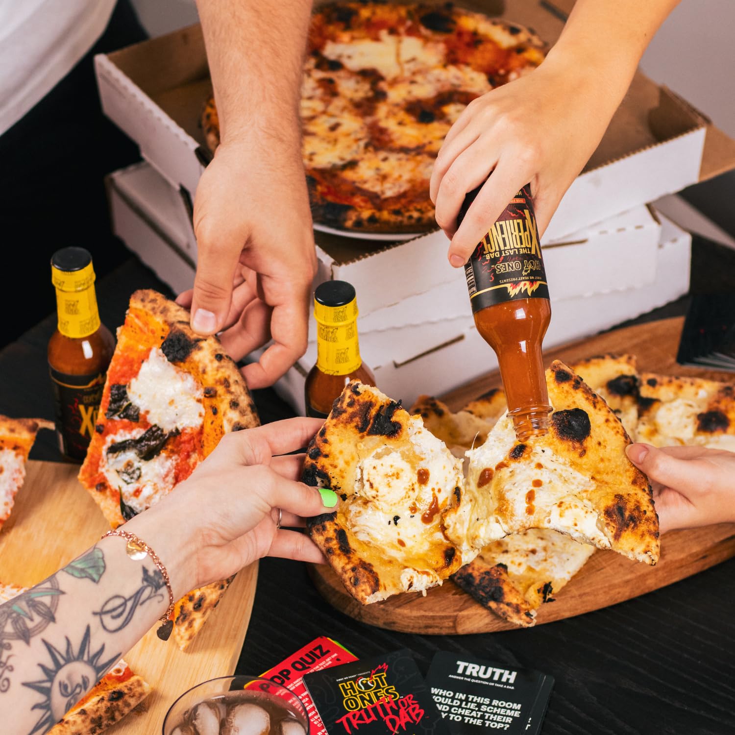 Hot Ones Last Dab Xperience ingredients show all-natural peppers and distillate.