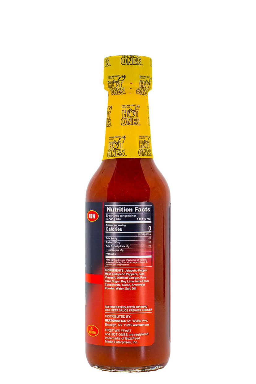 Hot Ones Pickled Garlic Sriracha on wings delivering a flavorful kick.