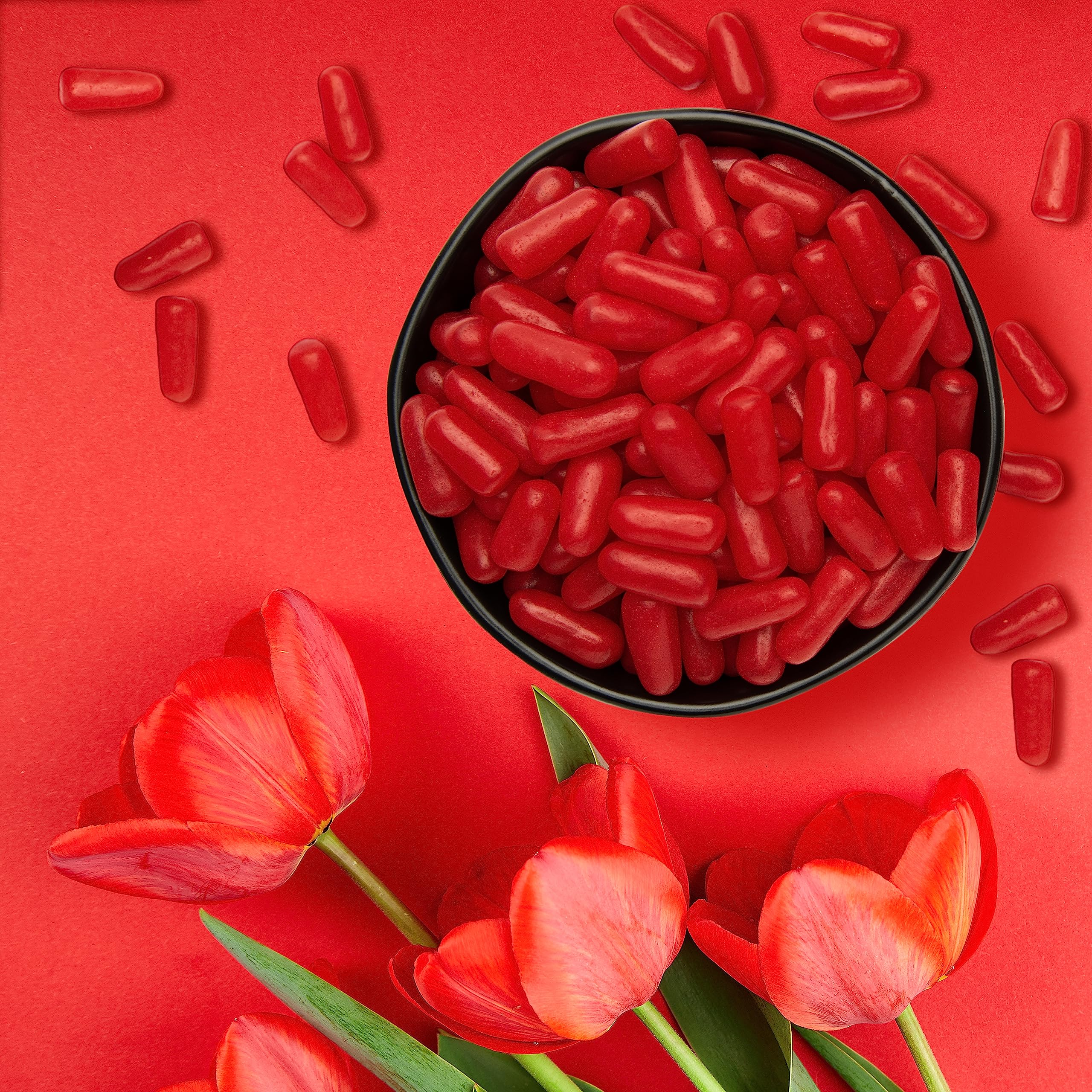 Hot Tamales Fierce Cinnamon candy on popcorn image demonstrates a movie-night flavor boost.
