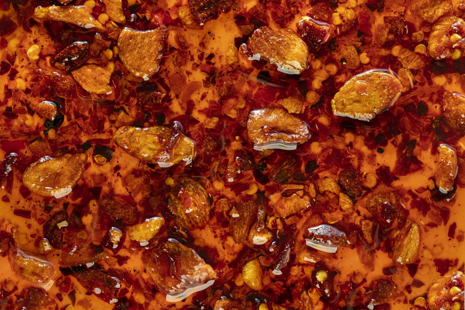 Hot Crispy Oil bottle ingredients label close-up shows key components for transparent flavor.