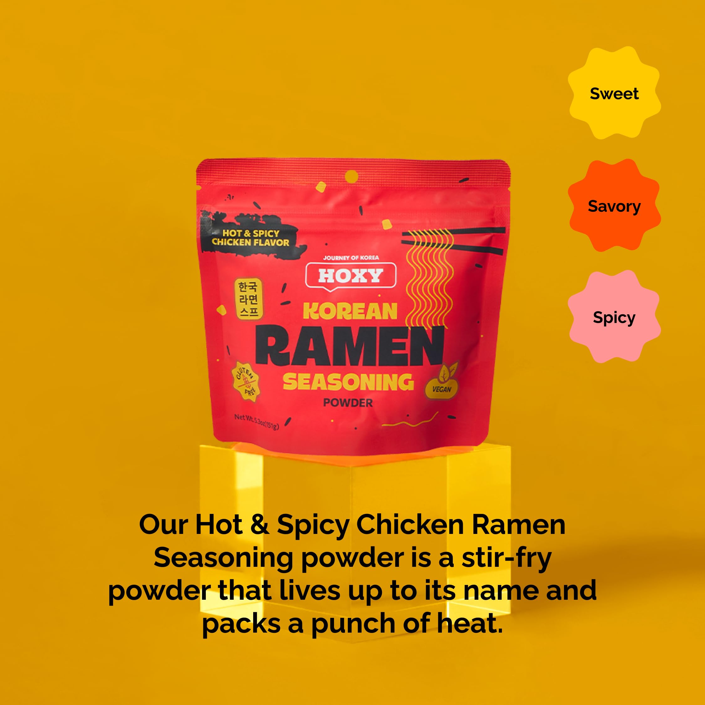 HOXY ramen seasoning powder dispense shot—sprinkle on noodles for bold stir-fry flavor.