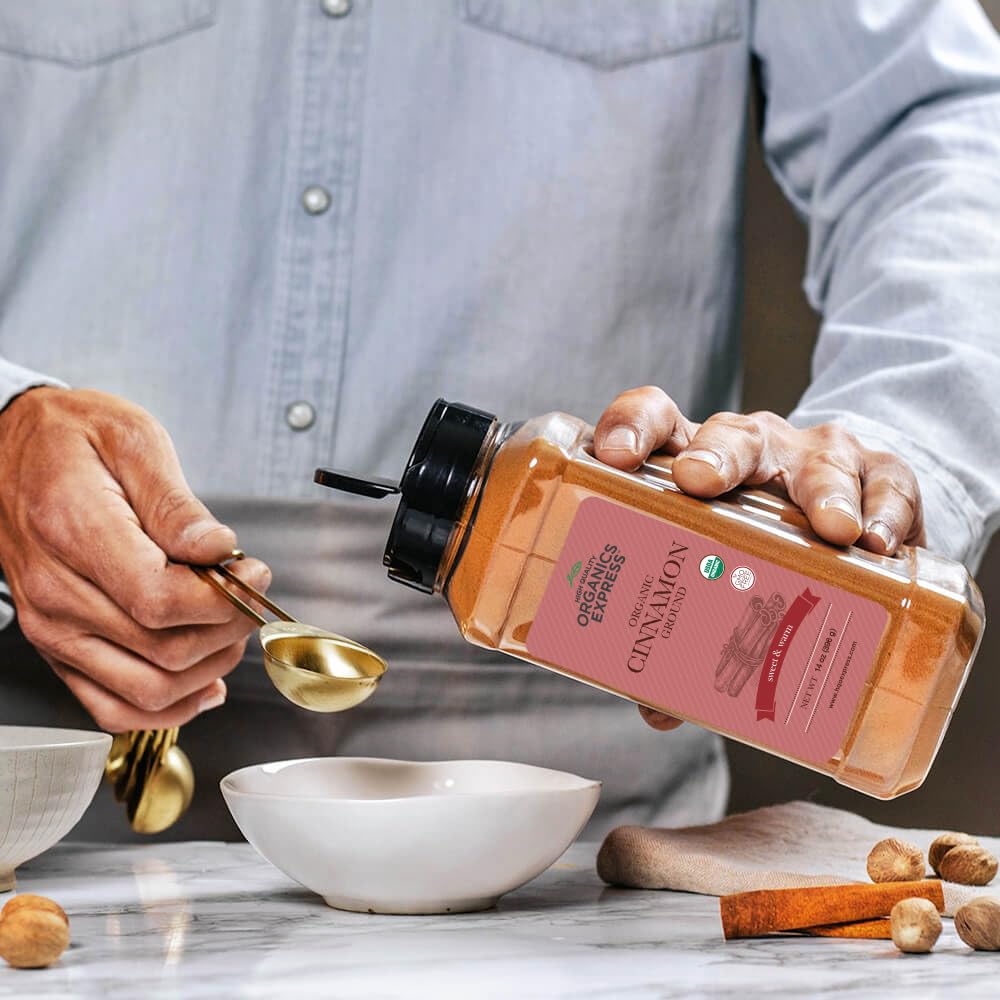 HQOExpress cinnamon powder with spoon ready to season beverages.