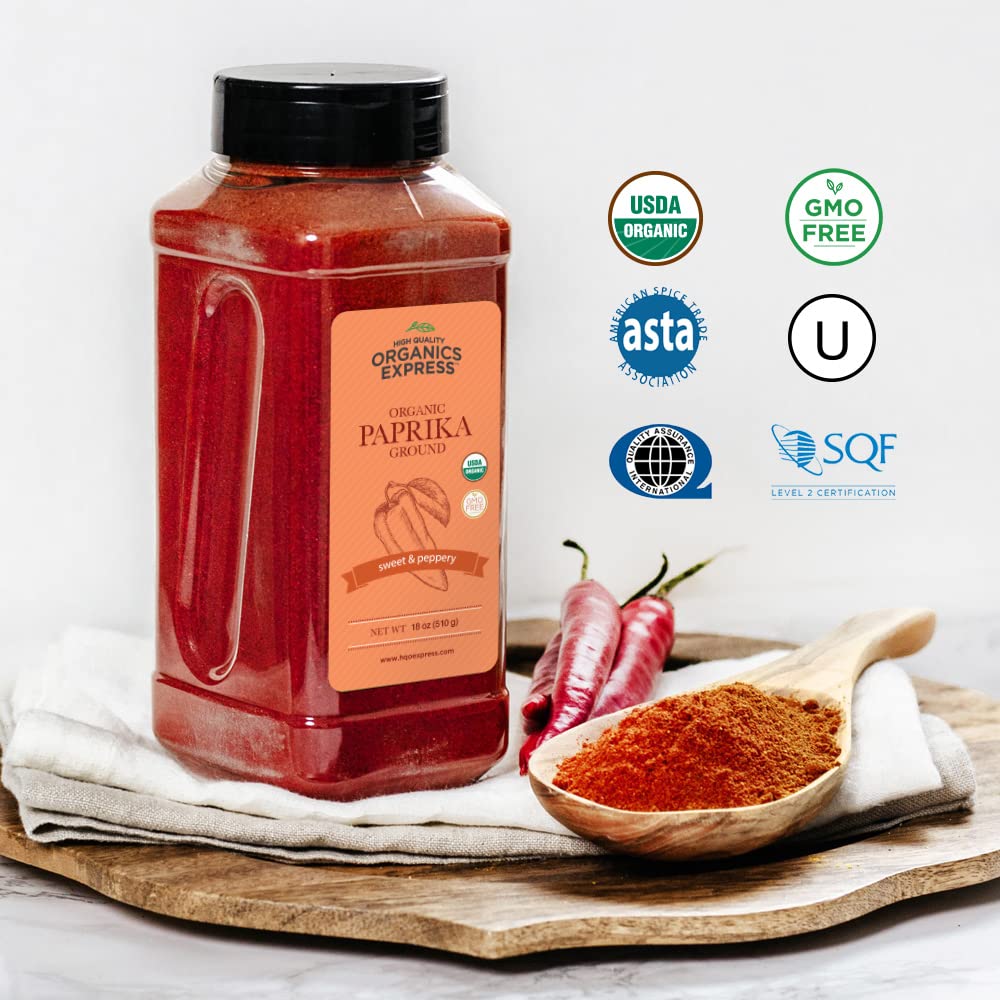 HQOExpress Organic Paprika on spoon emphasizes sweet aroma and mild heat.