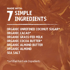 Hu Bar almond butter almond crunch mc on wooden board suggests versatile snacking and baking uses.