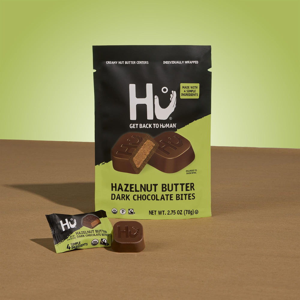 Hazelnut butter center visible inside Hu bite close-up.