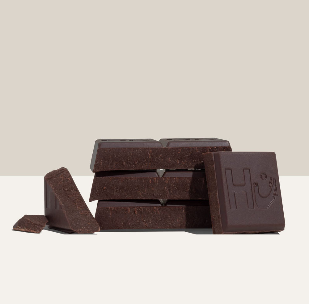 Six-pack of Hu bars on shelf supports quick, convenient chocolate moments.