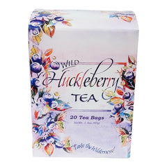 Huckleberry Haven tea bag in cup demonstrates rich aroma and balanced flavor.