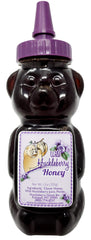 Huckleberry Haven wild huckleberry honey bear 12oz bottle, perfect for tea sweetness.