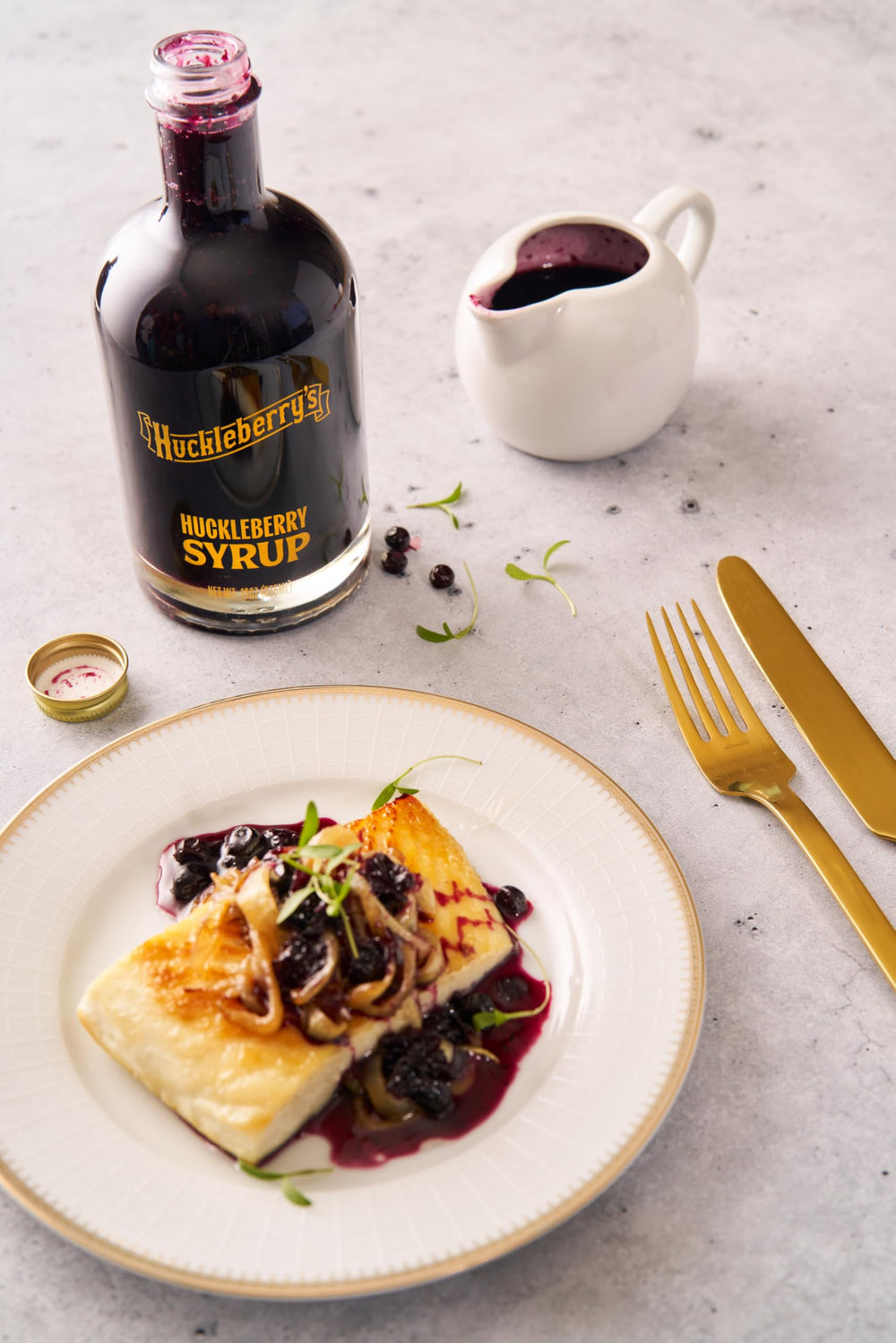 HUCKLEBERRY'S BREAKFAST · LUNCH small-batch USA-made labeling on glass bottle
