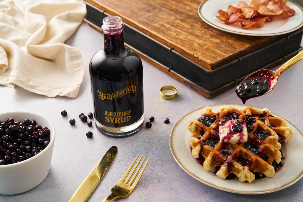 HUCKLEBERRY'S BREAKFAST · LUNCH bottle shown beside french toast for versatile use