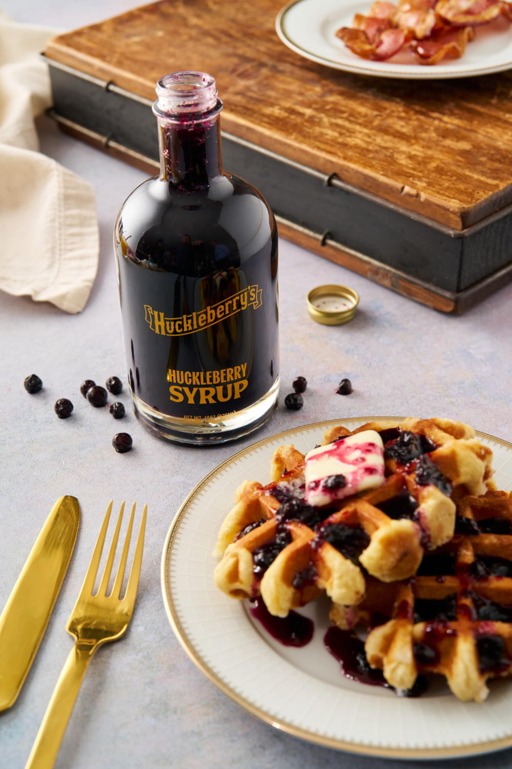 HUCKLEBERRY'S BREAKFAST · LUNCH syrup on ice cream adds fruity richness