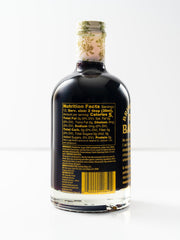 HUCKLEBERRY'S BREAKFAST · LUNCH huckleberry syrup drizzle on waffles highlighting Northwest flavor