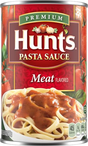 Plate of spaghetti topped with Hunt's Meat Pasta Sauce