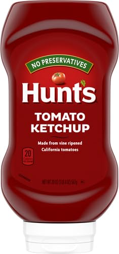 Hunt's Tomato Ketchup as a burger topping to add tangy tomato flavor.