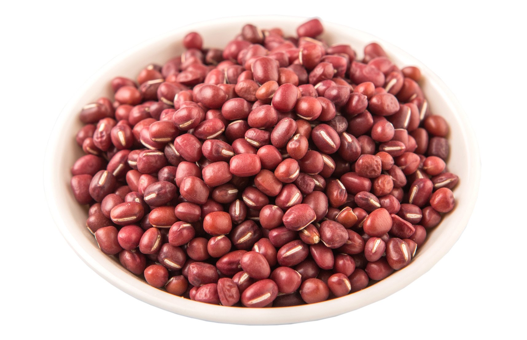 Adzuki beans in a glass jar on the kitchen counter