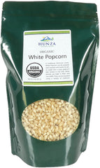 Hunza White Popcorn in a green stand-up pouch, ideal for cozy movie nights.