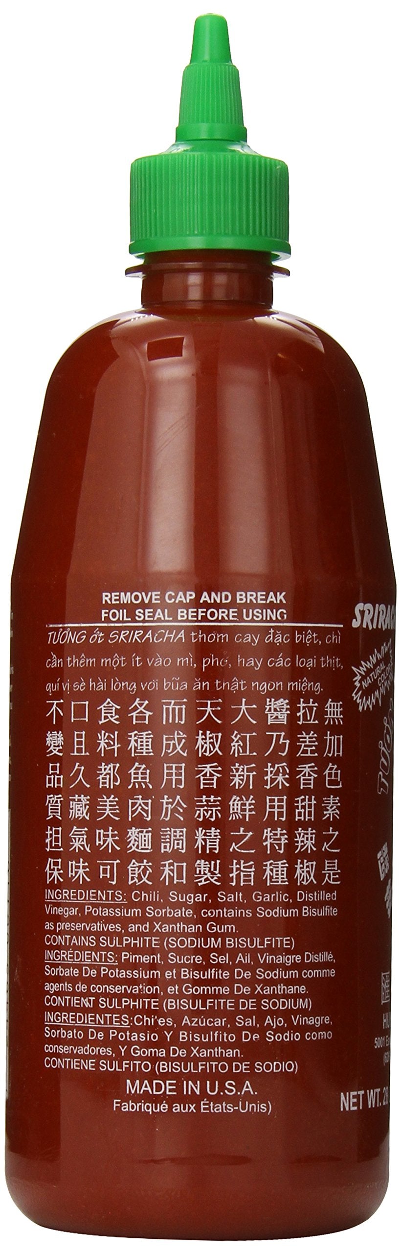 Huy Fong Sriracha bottle on hot dogs for added kick.