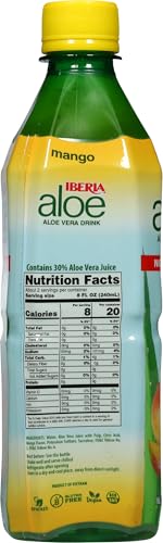 Pouring Iberia Aloe Vera Drink with Pulp Mango into a glass, no sugar