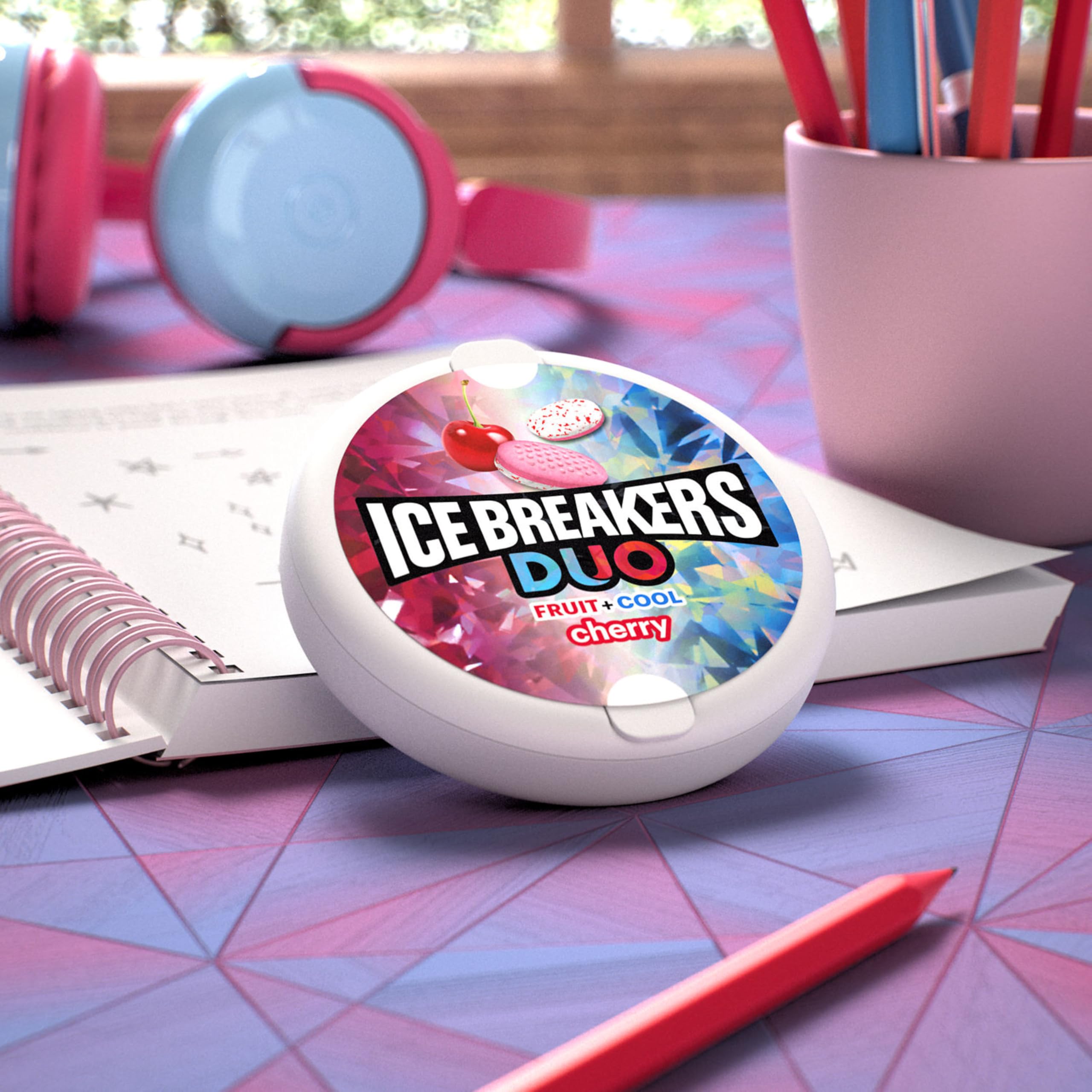 Ice Breakers Duo Cherry Mint Puck with cooling crystals for lasting freshness