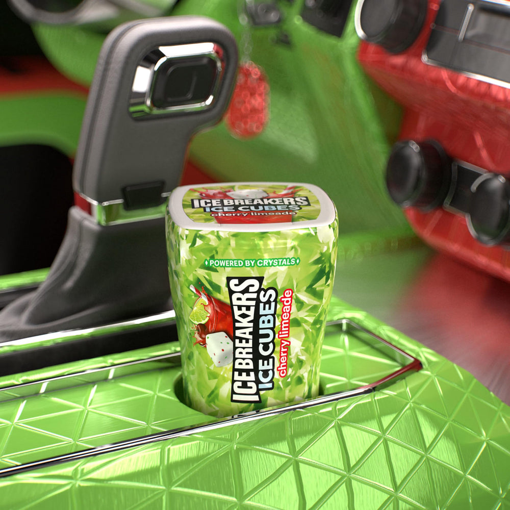 Ice Breakers Ice Cubes bottle resting in a car dash for quick breath refreshment