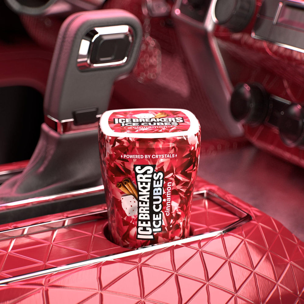 Gum packs in a purse or backpack featuring Ice Breakers Ice Cubes Cinnamon