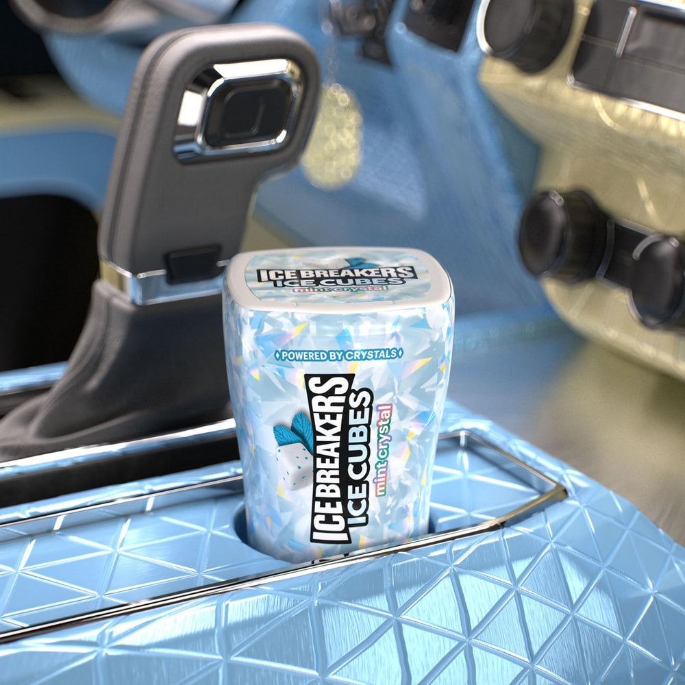 Gum by the car cup holder offers quick breath refresh.