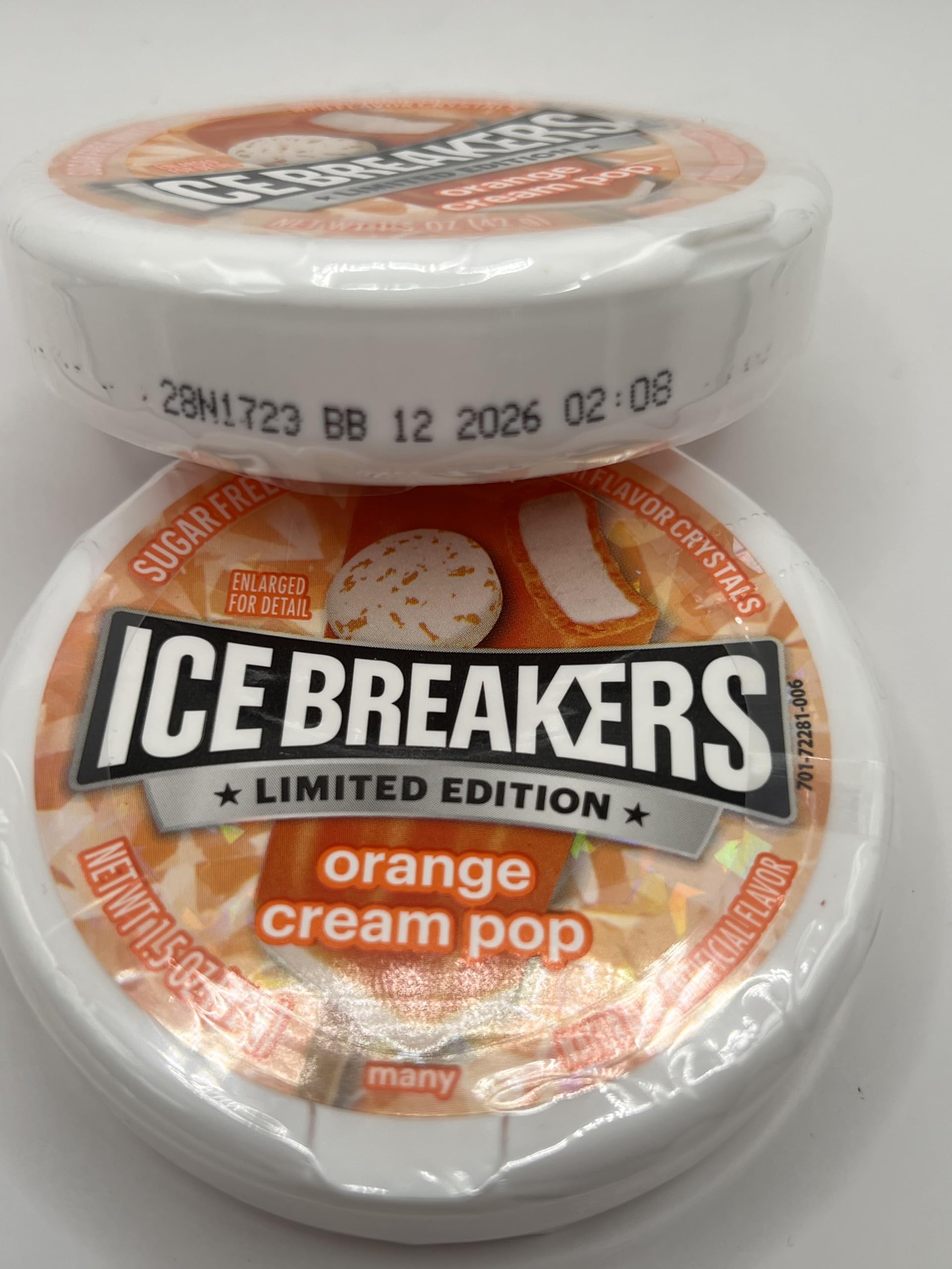 Ice Breakers Orange Cream Pop Mints portable container; pocket-friendly freshness anywhere