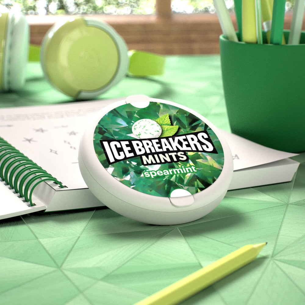 Ice Breakers tin displayed in a school desk or lunch box.