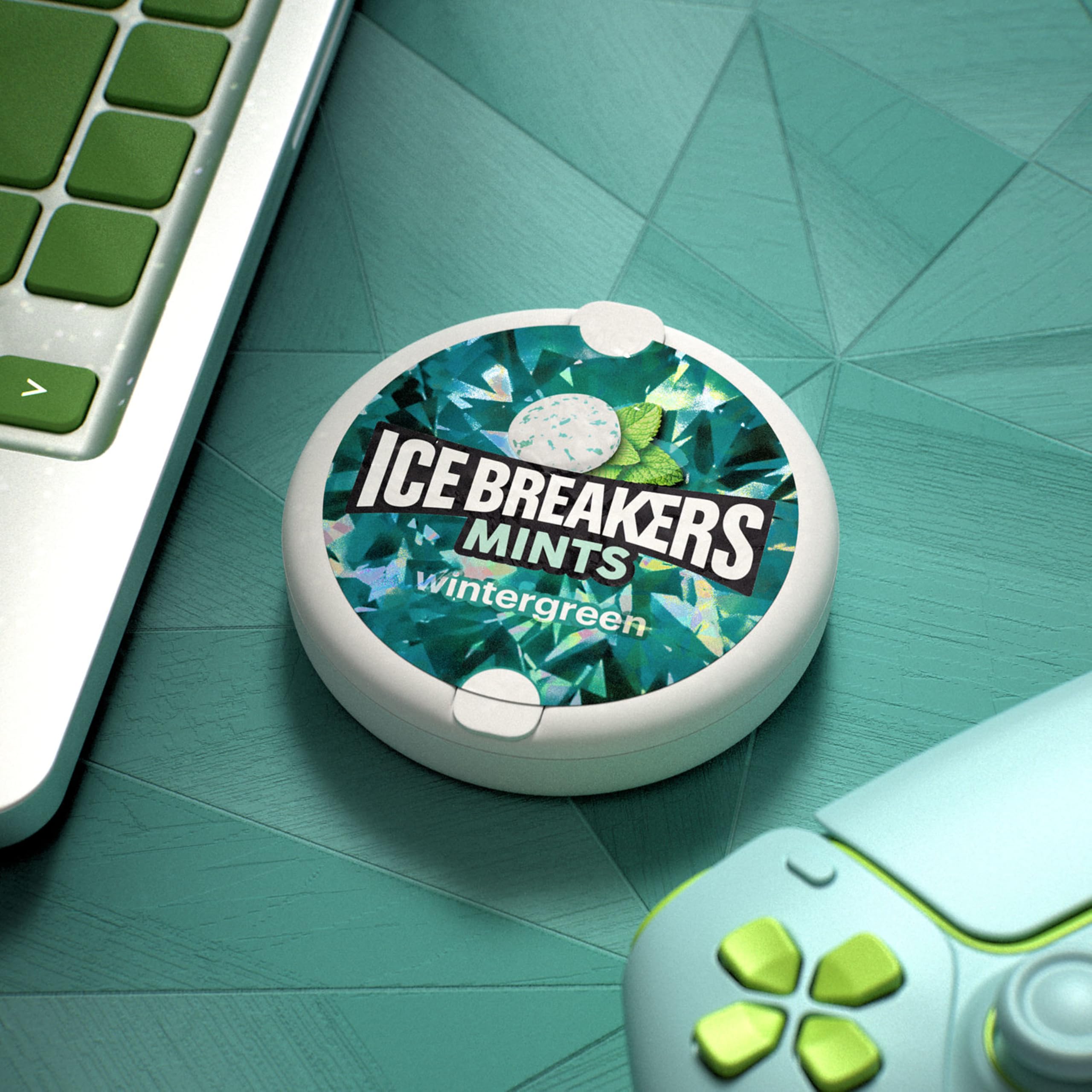 Ice Breakers Wintergreen mints in a car tin for in transit refreshment