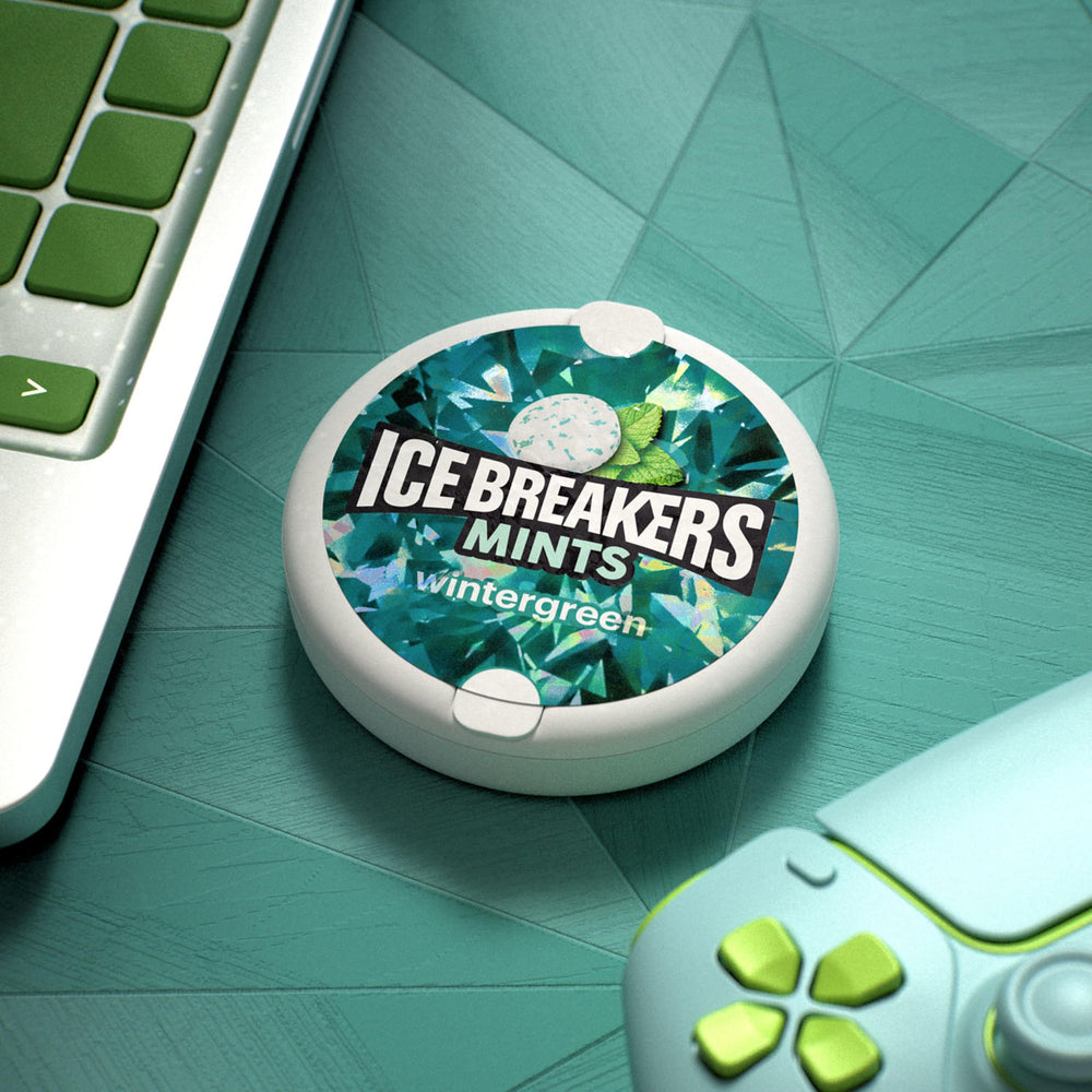 Ice Breakers Wintergreen mints in a car tin for in transit refreshment