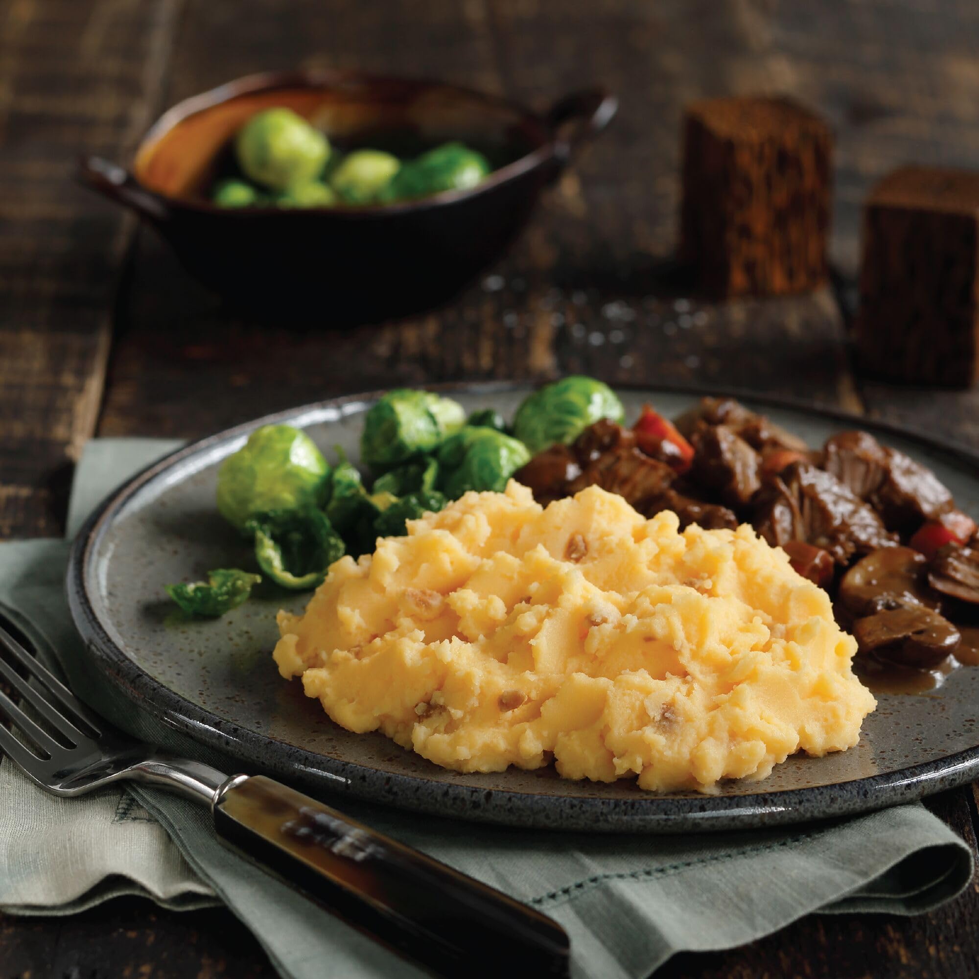 Idahoan Smokey Cheese & Bacon Mashed Potatoes gluten-free label highlights natural, gluten-free option