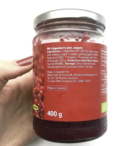 IKEA Food Lingonberry preserves spread on toast with cheese.