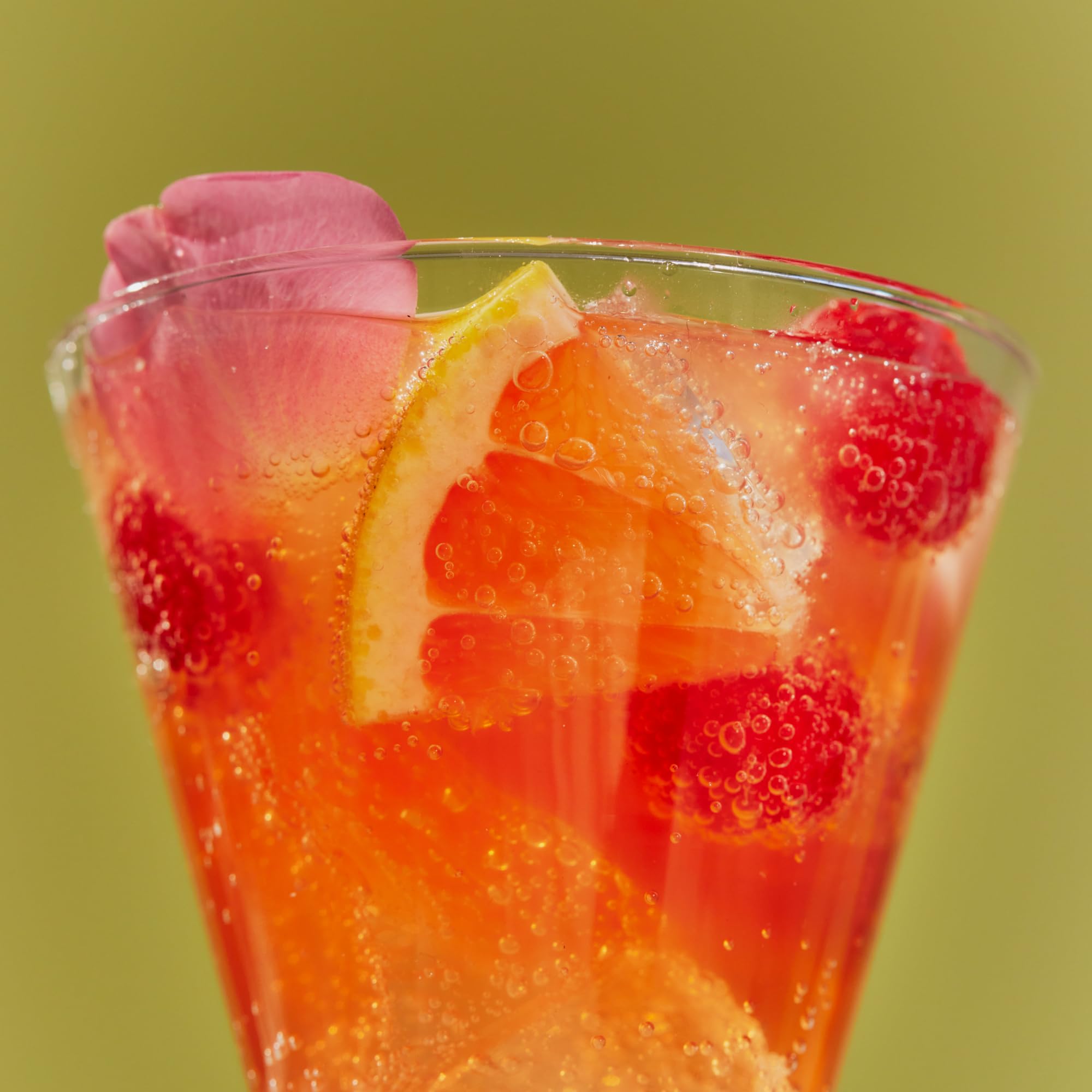 De Soi Tres Rosé with lemon twist garnish for light, paired tasting.