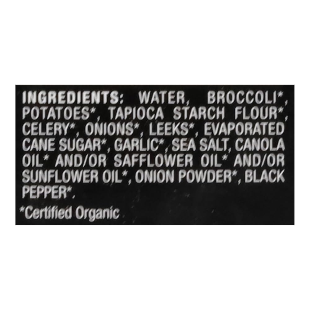 Imagine Organic Creamy Broccoli Soup ingredient closeup highlights broccoli and herbs.