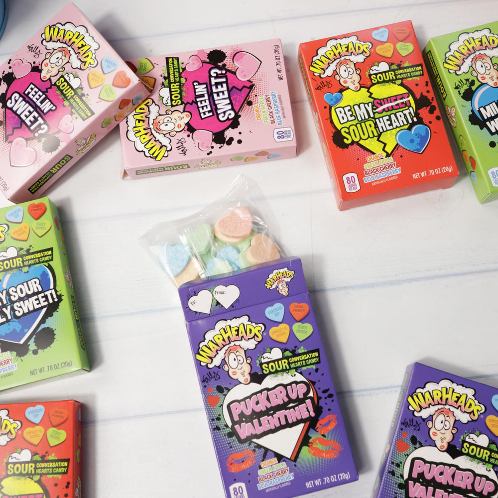 Imaginings 3 Warheads orange hearts bring bright zing to gift boxes.