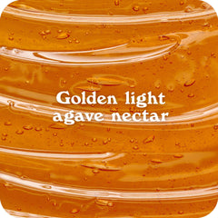 Drizzle of IN THE RAW Organic Light Agave Nectar over oatmeal for natural sweetness