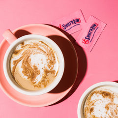 IN THE RAW Sweet'N Low on a coffee cup for easy, zero calorie sweetening.