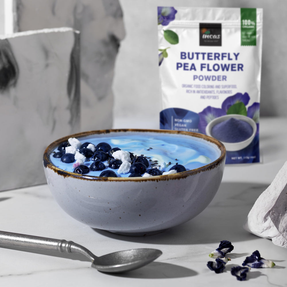 Incas Color-changing tea with lemon demonstrates blue to purple color shift.