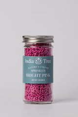India Tree Bright Pink Sprinkles on cookie shows bold finish.