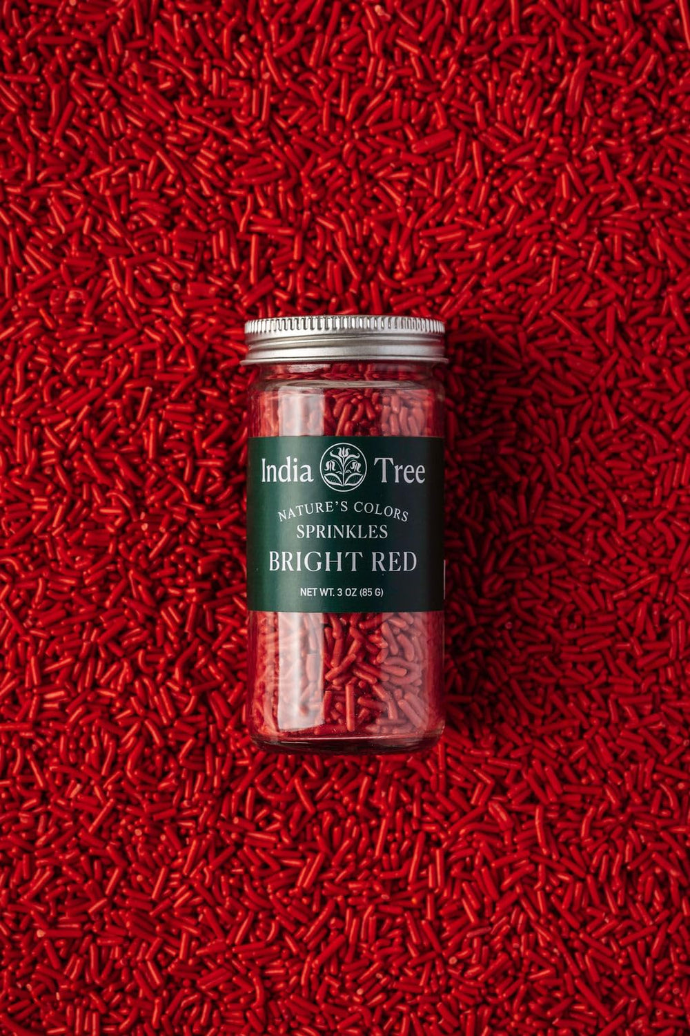 India Tree Bright Red Sprinkles on cupcakes for festive red finish